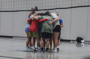 A group of students huddled together